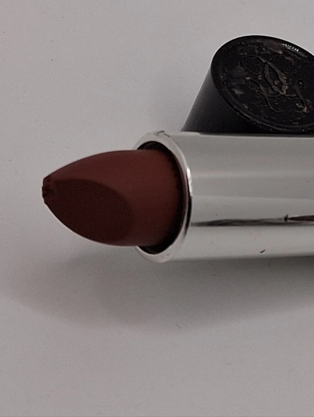 Guerlain #04 is a very warm-toned, light-medium copper semi-matte finish/new No